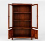 Sheesham wood bookshelf with glass doors and diamond-carved lower storage doors in teak finish, front view