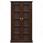 Dark walnut finish sheesham wood glass door bookcase with brass ring handles styled in a living room with books