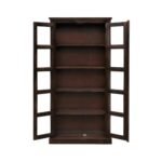 Dark walnut finish sheesham wood glass door bookcase with brass ring handles styled in a living room with books